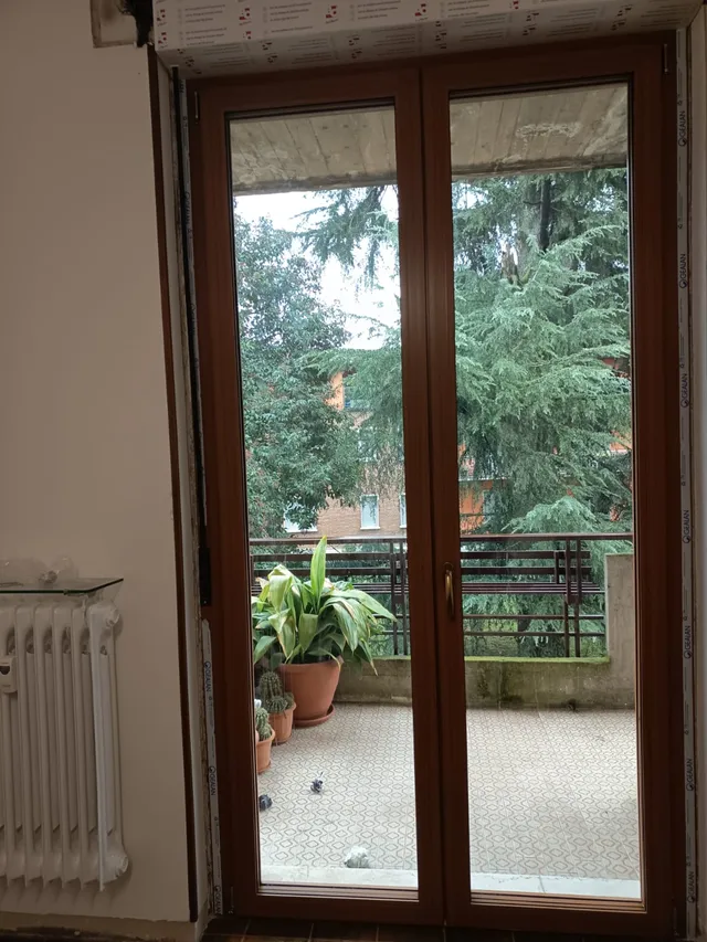 Portafinestra in legno a due ante